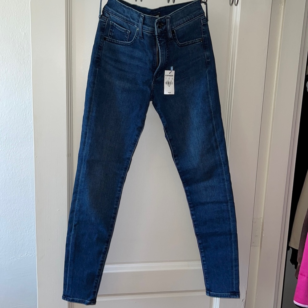 Express mid rise skinny jeans
